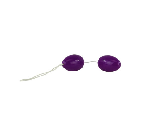 Фиолетовые анальные шарики вытянутой формы