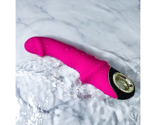 Ярко-розовый рельефный вибратор-реалистик - 22,5 см.