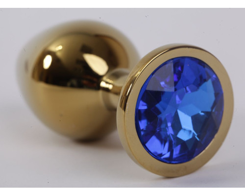 Золотистая анальная пробка с синим кристаллом - 9,5 см.