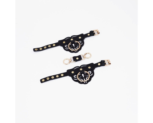 Черные наручники с золотистой фурнитурой