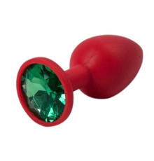 Красная силиконовая анальная пробка с зеленым стразом - 6,8 см.