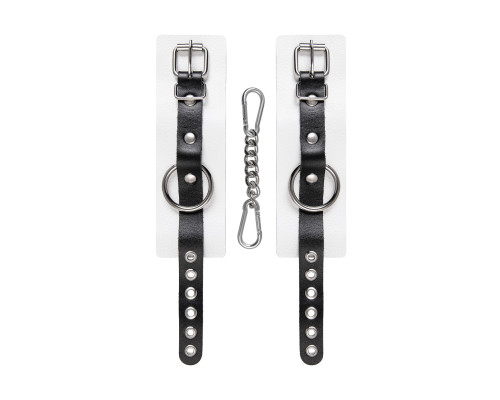 Бело-черные кожаные наручники с одним ремешком с люверсами