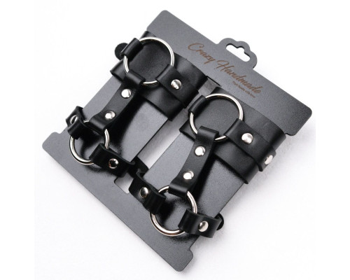 Черные наручники с креплением на кисть руки