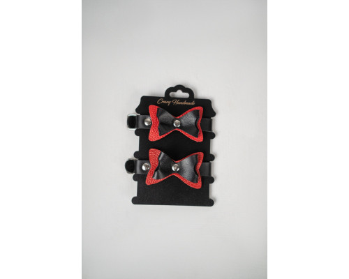 Черно-красные кожаные наручники с бантиками