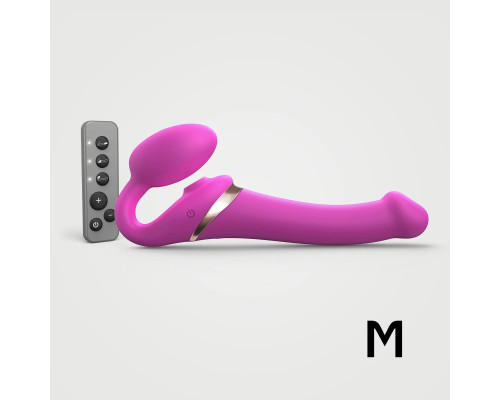 Ярко-розовый безремневой страпон Multi Orgasm Size M с клиторальной стимуляцией
