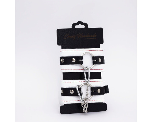 Бело-красные кожаные наручники