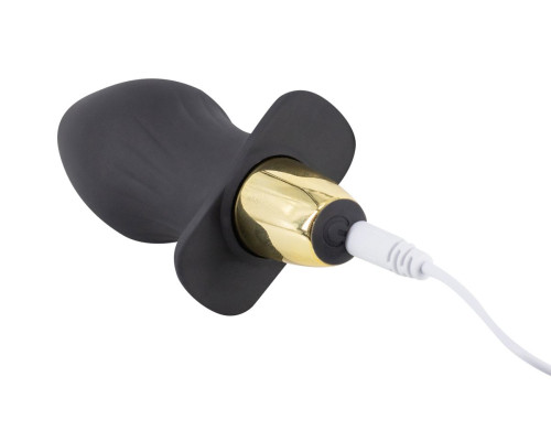 Черная силиконовая анальная пробка с вибрацией - 10,5 см.