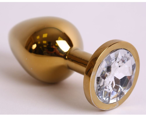 Большая золотистая анальная пробка с прозрачным кристаллом - 9,5 см.
