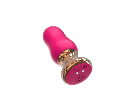Розовая перезаряжаемая анальная пробка с вибрацией - 8,9 см.