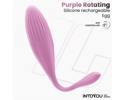 Нежно-розовое интерактивное виброяйцо с функцией вращения Rotating Beads