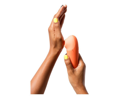 Оранжевый бесконтактный клиторальный стимулятор Romp Switch X